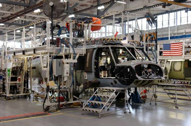 A Sikorsky UH-60M Black Hawk sits partialy built on the... 139509 ...